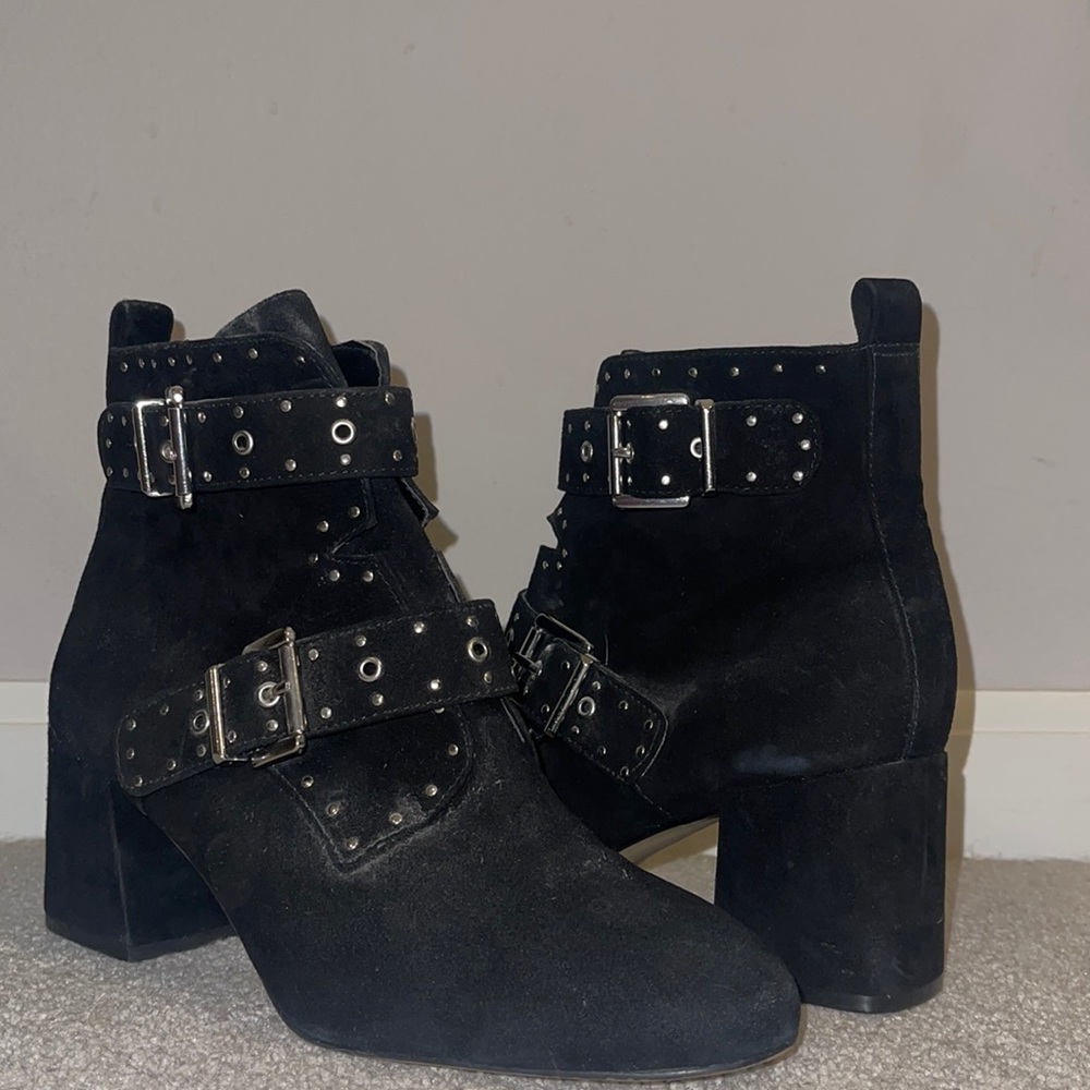 Black suede buckle booties.